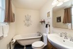 Prep for Your Next Day Out in SoHa in the Comfort of the Main Level Bathroom